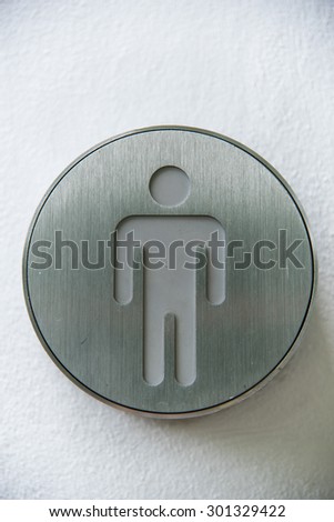 male symbol made by metal on the white background