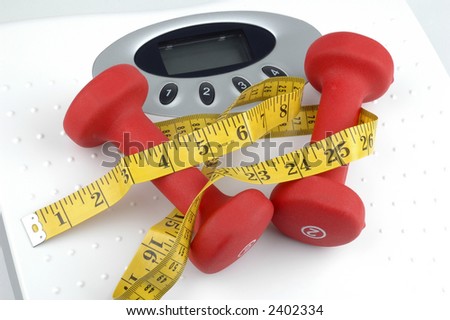Weights on top of a weight scale.