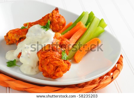 Buffalo style chicken wings with creamy blue cheese dressing.