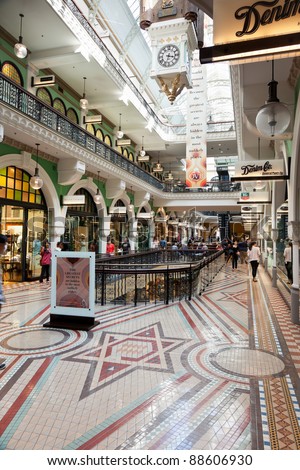 SYDNEY - NOVEMBER 4: Shoppers in the The Queen Victoria Building on November 4, 2011. First opened in 1820 as a market selling grains, livestock, fabric and groceries it is now a premium retail mall.
