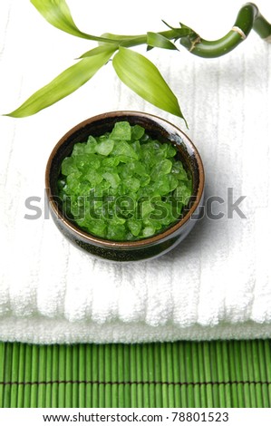 lucky bamboo grove and towel green bath salt in bowl on mat