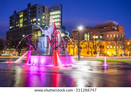 Three Rivers Fountain in Victoria square with twilight sky, Adelaide, Australia. Taken in July 10, 2015. It was designed by artist John Dowie.
