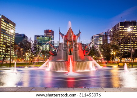 Three Rivers Fountain in Victoria square with twilight sky, Adelaide, Australia. Taken in July 10, 2015. It was designed by artist John Dowie