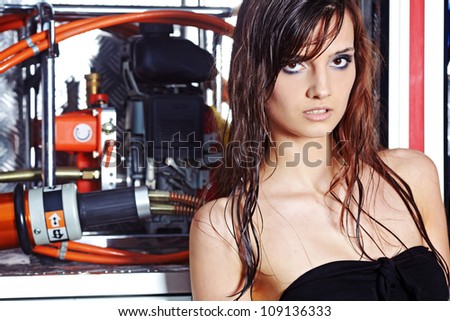 Fashion woman in summer  body  and fire truck
