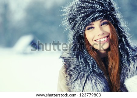 Similar – Image, Stock Photo Young woman in fur coat and lingerie sitting in snowy field