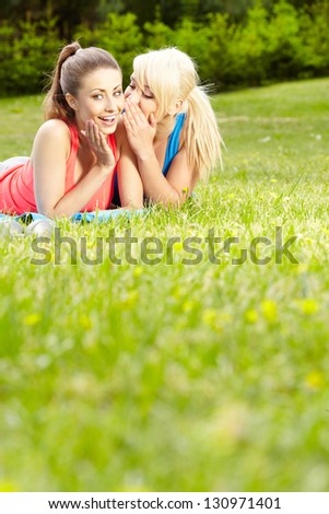 Portrait of two fitness woman having fun in summer environment
