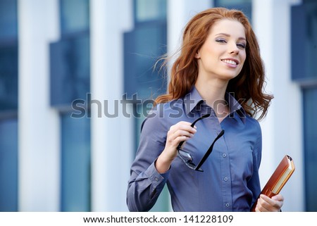 Young happy women or student on the property bussines background