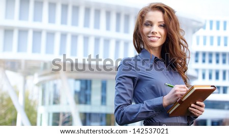 Young happy women or student on the property business background
