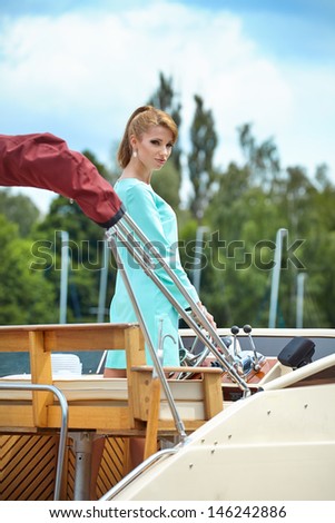 Summer woman on a yacht