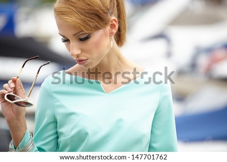 Elegant retro woman wear dress ,  near the yacht marine. 60\'s inspiration