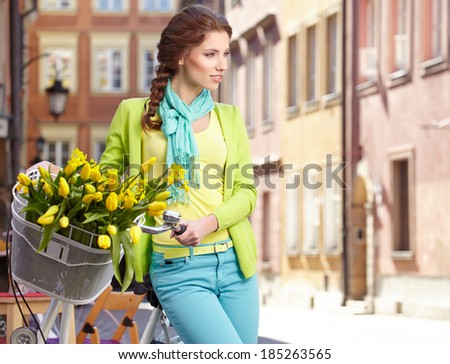 Spring woman with flowers in Paris street