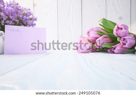 tulips and post card. March 8th, mother\'s day, valentine\'s day, International Women\'s Day, lilac, congratulate, celebrate