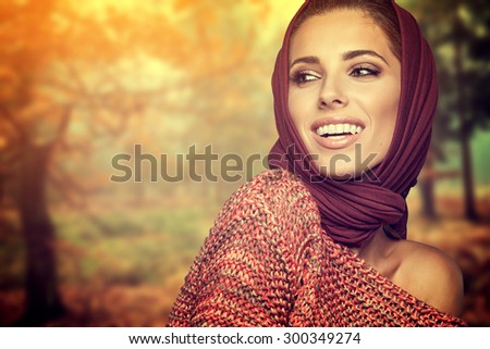 Fashion woman in autumn forest