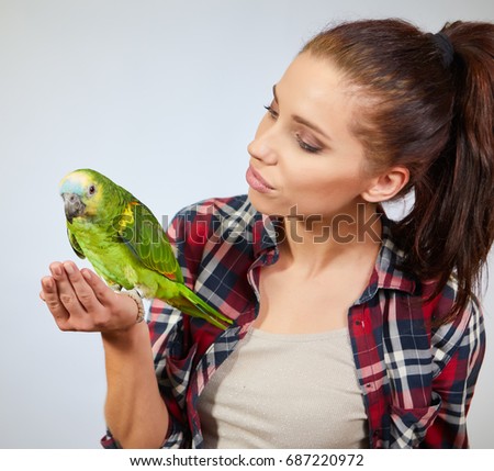 Similar – Image, Stock Photo Hand Holding Bird Feather Wing on Bokeh Background with sun light rays. Spring time season.