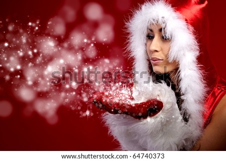 young christmas woman holding star over red background