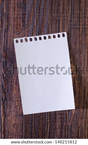 note on wooden board