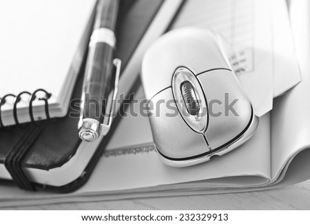 computer mouse and notepad