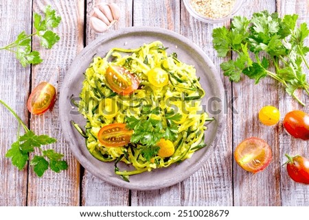 Similar – Foto Bild Hausgemachte Zucchini-Spaghetti mit Pestosauce, Brokkoli und Kirschtomaten