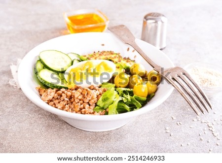 Similar – Image, Stock Photo Preparation of tasty buckwheat balls on kitchen table with ingredients. Healthy home cooking and eating concept