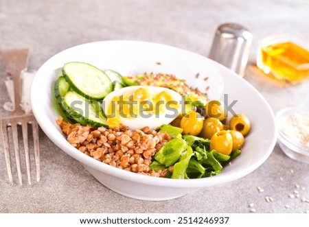 Similar – Image, Stock Photo Preparation of tasty buckwheat balls on kitchen table with ingredients. Healthy home cooking and eating concept