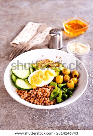 Similar – Image, Stock Photo Preparation of tasty buckwheat balls on kitchen table with ingredients. Healthy home cooking and eating concept