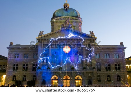 BERN - OCTOBER 14: The profile of Switzerland is projected on the Swiss government building (Bundeshaus) at the sound and light show \