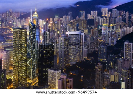 Night view over the central Hong Kong Skyline. Skyscrapers are densely crowded on Hong Kong Island.