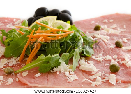 White meat   Carpaccio with Parmesan Cheese in white background