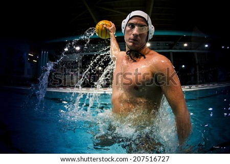 water polo player in swimming pool