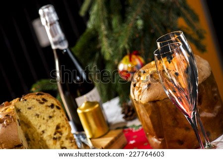 wine glasses and italian typical christmas cake called \