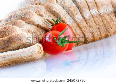 sliced of bread with tomatoes on White background