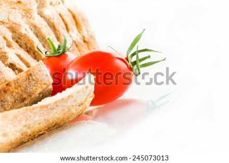 sliced of bread with tomatoes on White background