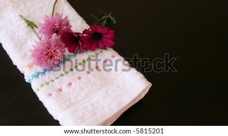 Light and Dark pink flowers on a hand towel