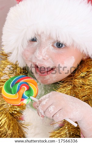 Christmas toddler got a lollipop reward for baking cookies