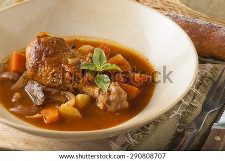 chicken stewed tomato sauce chicken stewed in a dish decorated on the table