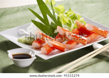 crab stick meal, decorate crab stick in white plate Japanese food.