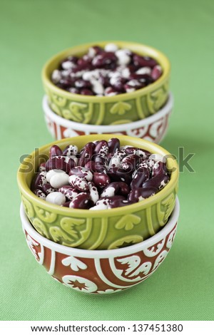 Four national oriental bowls with red and white beans