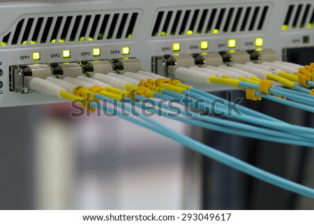 Optical fibre communication panel in a data center.