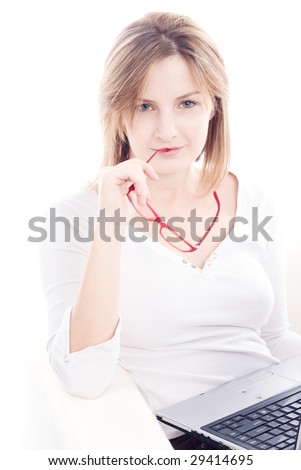 Woman with laptop on the couch