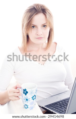 Woman with laptop on the couch