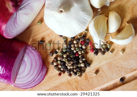 Garlic, onion and spices, different color of pepper