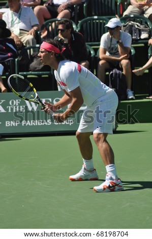 INDIAN WELLS, CALIFORNIA - MARCH 14.  Spain\'s Rafael Nadal prepares to receive serve during an early round doubles match March 14, 2010 at the BNP Paribas Open