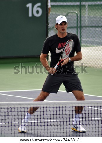INDIAN WELLS, CA - MARCH 17.  Switzerland's Roger Federer practices his volley March 17, 2011 at the BNP Paribas Open.