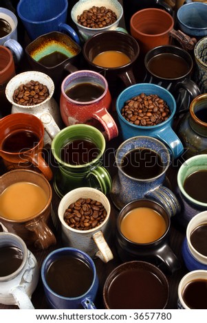 A collection of ceramic coffee mugs filled with different coffee - background image for coffee establishments.