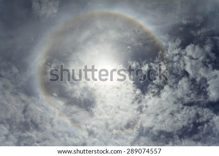 sun halo, sun with circular rainbow in the sky on Summer Solstice Day