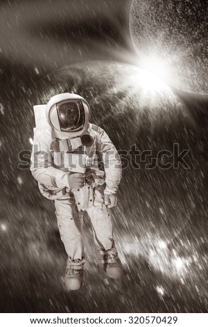 Astronaut wearing pressure suit in a space background, vintage filter style