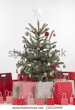 Beautiful Christmas tree with present and decorations