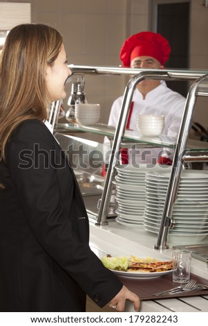 Business woman take cafeteria lunch