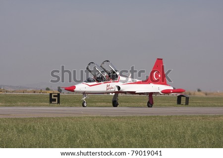 IZMIR,TURKEY – JUNE 06 :turkish demonstration team ´´ turkish stars´´  jet takes off at ´´Airshow Turkey´´ on june 06 2011 in izmir, Turkey,