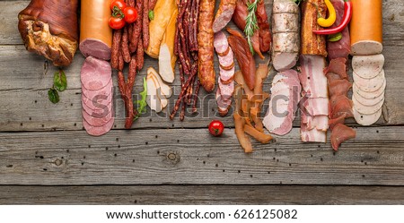 Similar – Image, Stock Photo German white sausage table top view. Bavarian veal sausage section